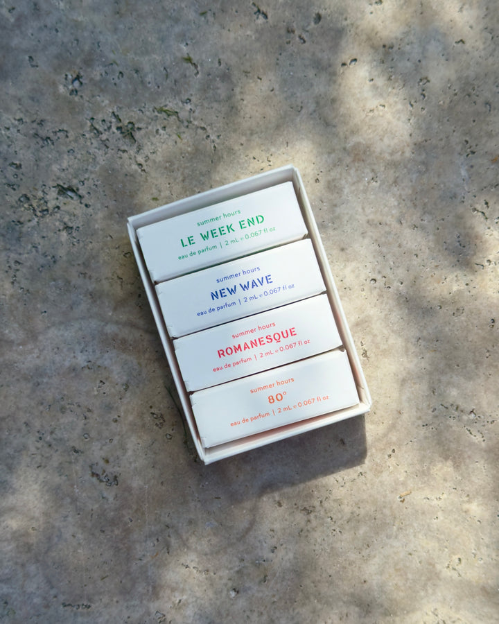Summer Hours Discovery Set of four perfume boxes titled Le Week End, New Wave, Romy, and 80 °
